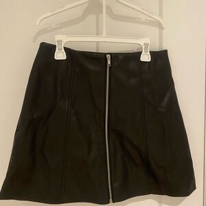 Leather black mini skirt with zipper in front.